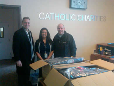 Knights donate Coats for Kids at the Catholic Charities' Kennedy Institute